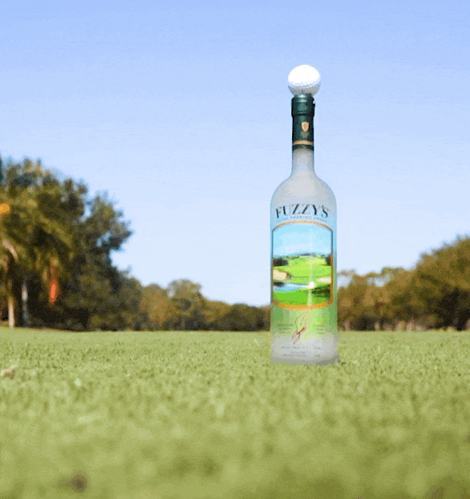 Animated GIF of a bottle of Fuzzy Vodka being used as a golf tee.